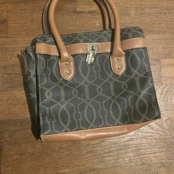 Dark Patterned Handbag with Brown details. - Picture 1 of 3